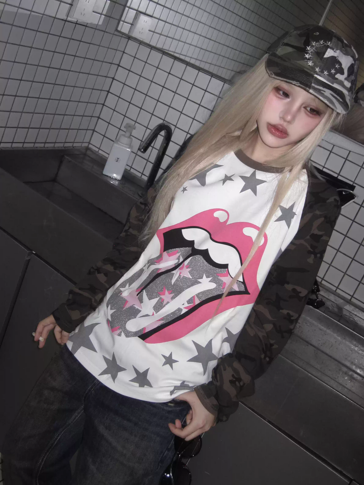 Tongue and Star Graphic Raglan Long Sleeve Top